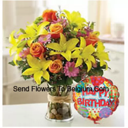 Yellow Tulips, Orange Roses And Other Assorted Flowers Arranged Perfectly In A Glass Vase Accompanied With A Birthday Balloon