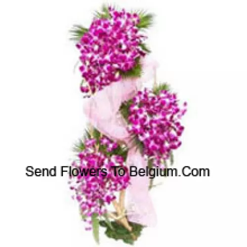 A 4 Feet Standing Arrangement Of Orchids