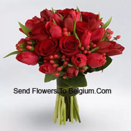 Bunch Of Red Roses And Red Tulips With Red Seasonal Fillers.