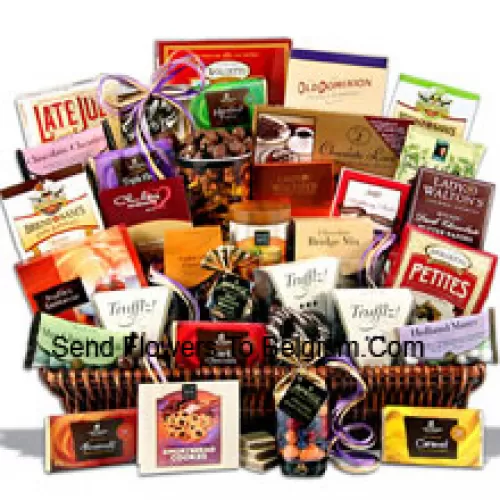 This giant chocolate gift basket is loaded with thirty of our favorite chocolate indulgences that are guaranteed to quench an army of chocolate lovers cravings! We create this masterpiece with only the finest award-winning gourmet chocolate delicacies sourced from around the globe. The result of our efforts is a chocolate gift basket unrivalled in the gift world! Inside they will discover the finest the confectionery world has to offer from the top brands  (Please Note That We Reserve The Right To Substitute Any Product With A Suitable Product Of Equal Value In Case Of Non-Availability Of A Certain Product)