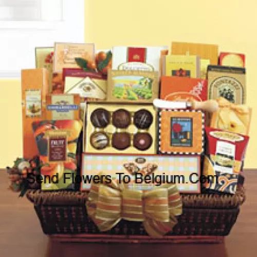 Can't decide what to get for those hard-to-buy for people on your holiday list? Do you have some business clients that you need to send thank you gifts to, but don't know what they like? Our office party gift basket is perfect when you need to send a large gift and insure there is plenty of variety for everyone to enjoy. Our wicker tray basket is brimming with gourmet goodies that anyone can appreciate, like California smoked almonds, Lindt truffles, a Ghirardelli caramel chocolate bar, Dolcetto wafer cookies, dried fruit, cashew crunch, cheese straws, carrot cake cookies, breadsticks, cheese, a cheese knife, crackers, English toffee, cookies, English tea cookies, toffee pretzels, toffee almonds, LeGrand truffles, and cappuccino mix. (Please Note That We Reserve The Right To Substitute Any Product With A Suitable Product Of Equal Value In Case Of Non-Availability Of A Certain Product)